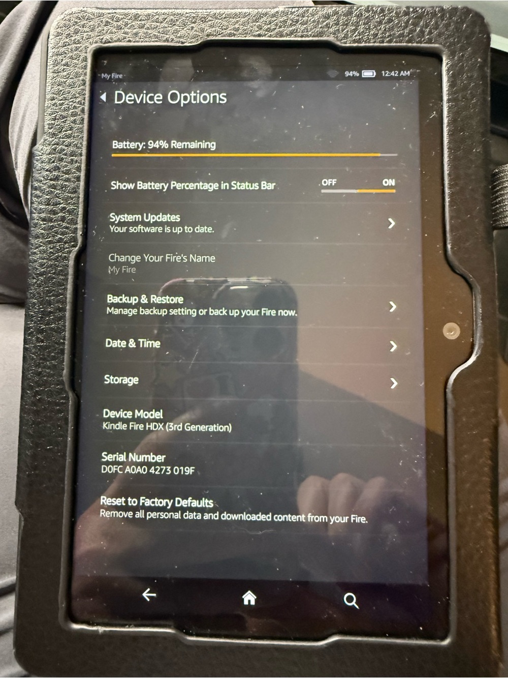 Amazon Kindle Fire tablet (generation 3) with black textured folio case